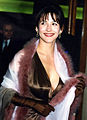 Actress Sophie Marceau wearing evening gloves, 1996.