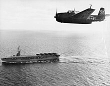 A TBM-3 Avenger flying over Badoeng Strait, c. 1950 TBM-3E over USS Badoeng Strait CVE-116.jpg