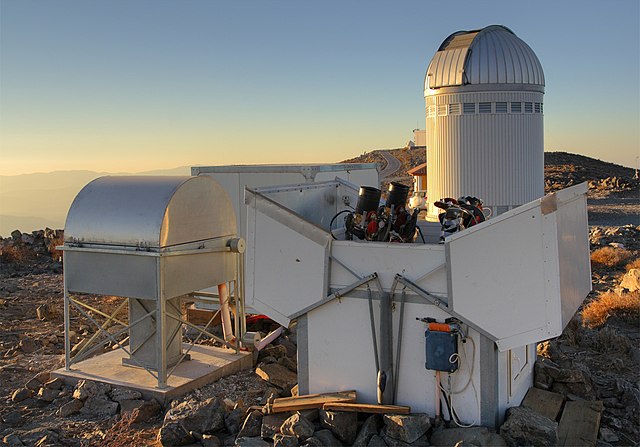 ASAS telescopes at Las Campanas Observatory. OGLE telescope visible in background.