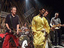 Melaku Belay onstage with The Ex in 2008 The Ex and Melaku Belay.jpg