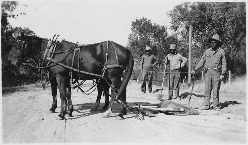 File:Three men and a horse drawn sled for moving rock - NARA - 285476.jpg