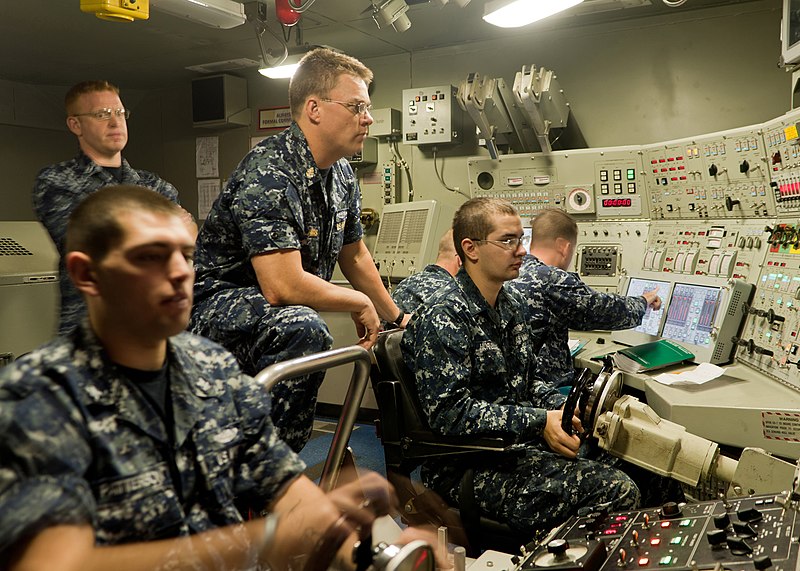 File:US Navy 110315-N-FG395-006 Senior Chief Missile Technician Wyatt Harris, center, Blue Team assistant navigator aboard the ballistic-missile submari.jpg