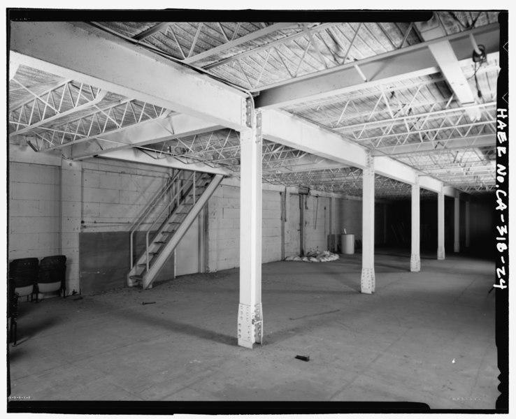 File:View of main floor of west wing showing post and beam, ceiling bracing and stairs, looking southeast. - College Heights Lemon Packing House, 519-532 West First Street, Claremont, Los HAER CA-318-24.tif