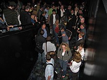 Werner Herzog talking with an audience member as a crowd exits an Encounters at the End of the World screening at the Paramount Theatre Werner Herzog in crowd.jpg