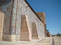 バンナイ（英語版）といわれるレンガ積みの工法により、カザフスタンのホージャ・アフマド・ヤサヴィー廟に彫られたクーフィー体によるムハンマドの名