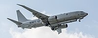 A Boeing P-8 Poseidon, tail number 168996, on final approach at Kadena Air Base in Okinawa, Japan. It has an AN/APS-154 Advanced Airborne Sensor (AAS) mounted underneath it.