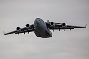 A Boeing C-17 Globemaster III, tail number 95-0103, taking off from RAF Mildenhall in the United Kingdom. It is assigned to the 62nd Airlift Wing and the 446th Airlift Wing at Joint Base Lewis McChord in Washington, USA.