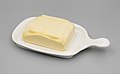 * Nomination Butter in butter dish --Jacek Halicki 03:27, 20 May 2023 (UTC) * Promotion  Support Good quality. --Rjcastillo 03:30, 20 May 2023 (UTC)  Comment Very good, but apparent dust spot in upper left. -- Ikan Kekek 07:13, 21 May 2023 (UTC)