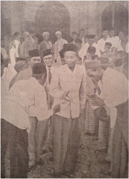 Mr. Assaat, Acting (Provisional) President of the Republic of Indonesia was greeted by residents after a Jumu'ah prayer at Sumedang Mosque during a wo