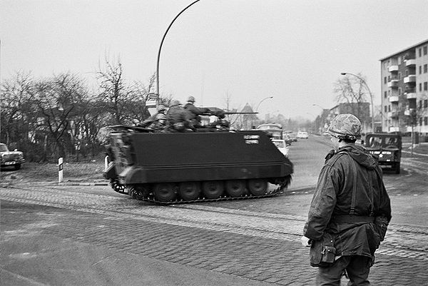 In 1969 U.S. military vehicles pass through the residential district of Zehlendorf, a routine reminder that West Berlin was still de jure occupied by 