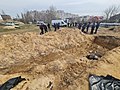 Ekshumacija 116 tijela stanovnika grada Buče iz masovne grobnice blizu crkve sv. Andrije, koje su ubili pripadnici ruske vojske