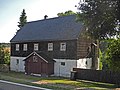 Residential stable house, side building and barn of a homestead