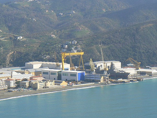 The shipyards of Riva Trigoso seen from Punta Manara. In the docks the Orizzonte-class destroyer Caio Duilio (D 554) nears completion.