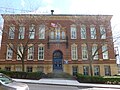 Community Academy, a public school of Boston, at 25 Glen Road in Jamaica Plain, Boston MA 02130. North side of building shown.
