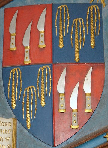 Coat of Arms at Crowland Abbey show scourges and the flaying knives of St Bartholomew