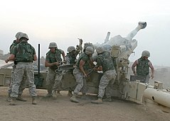 USMC M-198 firing outside of Fallujah, Iraq