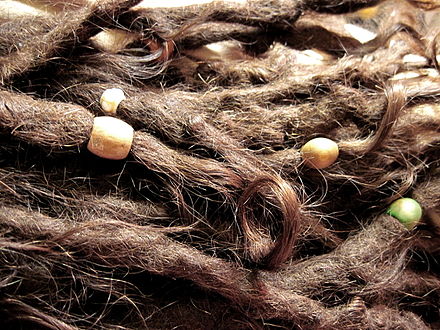 Hippie dreadlocks decorated with beads