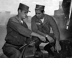 Don Drysdale and Sandy Koufax changing parts on a 2 1/2-ton truck at the U.S. Army Reserve Center in Van Nuys, California