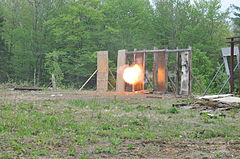 An explosive door breaching test Explosive Breach Training at Camp Ethan Allen Training Site 130511-Z-WM282-951.jpg