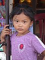 Girl on Sidewalk - Phnom Penh - Cambodia (48322181221).jpg