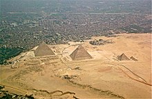 The Egyptian pyramids of the Giza Necropolis, as seen from the air. Built circa 2600 BC. Giza-pyramids.JPG