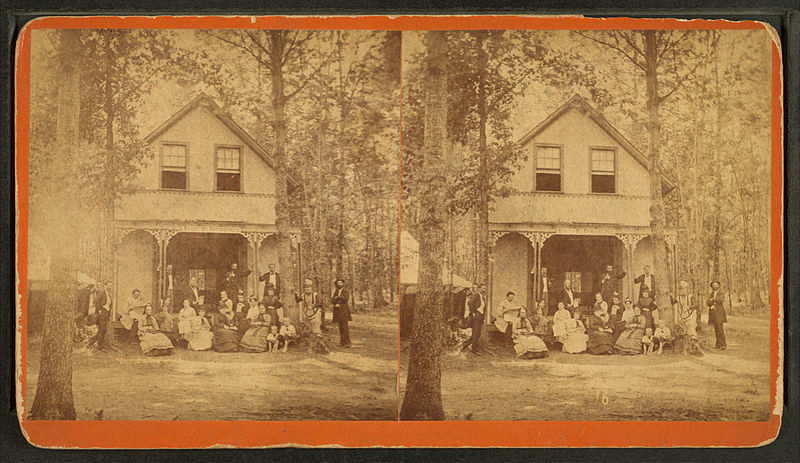 File:Group gathered on a porch of a large house surrounded by woods, by Goldsmith & Lazelle.jpg