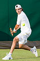 Guido Pella competing in the first round of the 2015 Wimbledon Qualifying Tournament at the Bank of England Sports Grounds in Roehampton, England. The winners of three rounds of competition qualify for the main draw of Wimbledon the following week.