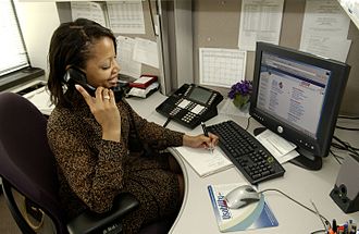 Office work Health professional answers phone.jpg