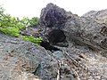 Le honden est visible au creux de la falaise