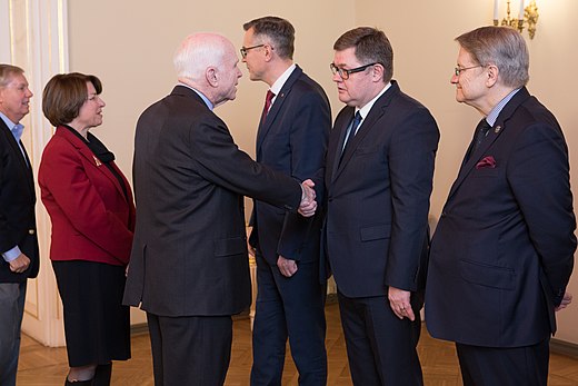 Klobuchar with Lindsey Graham and John McCain in Latvia in 2016