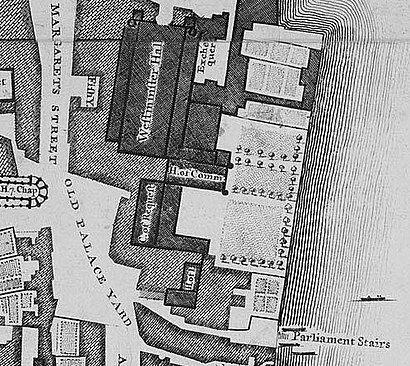 The Old Palace was a complex of buildings, separated from the River Thames in the east by a series of gardens. The largest and northernmost building is Westminster Hall, which lies parallel to the river. Several buildings adjoin it on the east side; south of those and perpendicular to the Hall is the medieval House of Commons. Further south and parallel to the river is the Court of Requests, with an eastwards extension at its south end, and at the south end of the complex lie the House of Lords and another chamber. The Palace was bounded by St Margaret's Street to the west and Old Palace Yard to the south-west; another street, New Palace Yard, is just visible to the north.