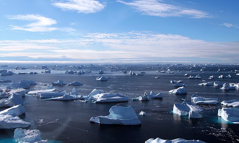 File:Kapitan Khlebnikov (icebreaker) between icebergs at Cape York.jpg