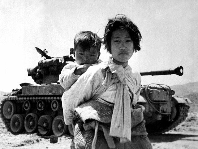 Image: Korean War Refugee With Baby (cropped)
