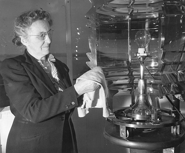 Fanny May Salter, a lighthouse keeper in the United States Coast Guard service, polishes the lens in the Turkey Point Light, Maryland in 1945.