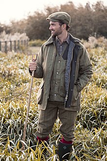 Man in full matching tweeds Man in full matching tweeds beating on the shoot day.jpg