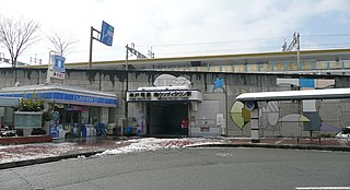 <span class="mw-page-title-main">Minami Woody Town Station</span> Railway station in Sanda, Hyōgo Prefecture, Japan