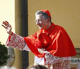 Archbishop Francesco Moraglia (incumbent) wearing a cardinal's scarlet vestment Moraglia Mira 4.JPG