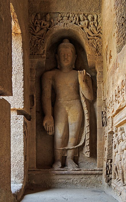 7 m (23 ft)-tall Buddha statue at entrance to the largest Kanheri cave