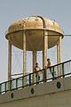 Water tower in Nasiriyah, Iraq, unusable because of war damage. Photo: Thomas Hartwell