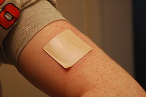 A 21 mg dose patch applied to the left arm Nicoderm.JPG