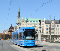 An A34 tram on line 7 at Djurgardsbron Number 7 tram bound for Sergels Torg in Stockholm Sweden.png