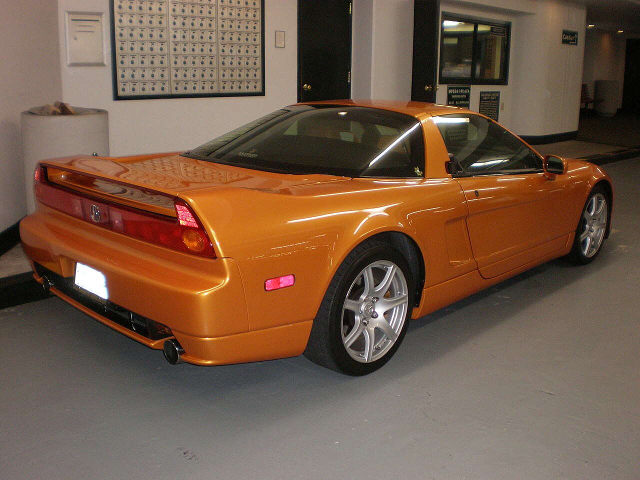 Image of Orange Acura NSX right side
