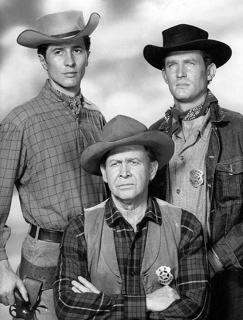 The original cast of Outlaws in 1960. Clockwise from top left: Jock Gaynor as Heck Martin, Don Collier as Will Foreman, and Barton MacLane as Frank Ca