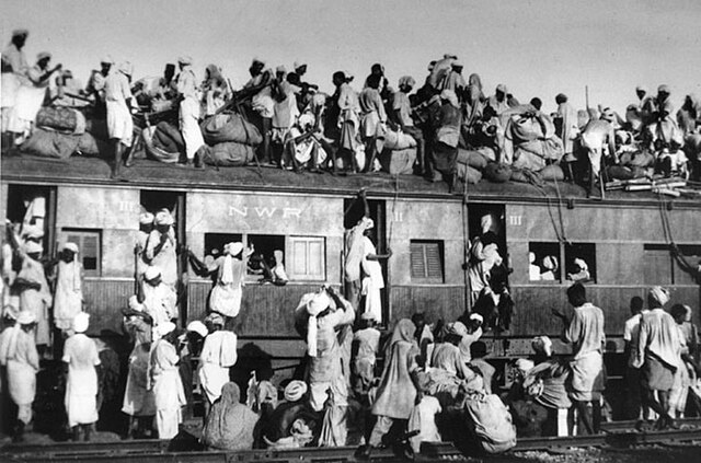Muslim refugees boarding a train in September 1947, similar to those involved in the massacre, with the intent of fleeing India