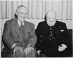 Photograph_of_President_Truman_sharing_a_laugh_with_British_Prime_Minister_Winston_Churchill_aboard_the_President%27s..._-_NARA_-_199016.jpg
