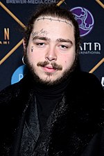 Post Malone, who charted the most (6) top ten singles in 2018, began 2019 with 2 singles in top ten. Post Malone 2018.jpg