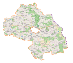 Mapa konturowa powiatu chełmskiego, po lewej znajduje się punkt z opisem „Rejowiec”