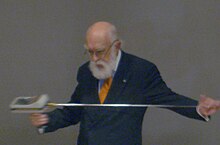 Skeptic James Randi at a lecture at Rockefeller University, on October 10, 2008, holding a US$800 device advertised as a dowsing instrument RandiNYC10.10.08ByLuigiNovi3.jpg
