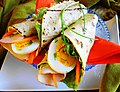 A roti wrap with boiled egg and smoked chicken in the Netherlands
