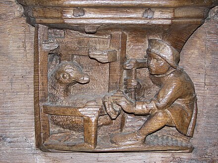 From the French proverbial phrase "Je me mêle des oies ferrées" – "I concern myself/meddle with shoeing geese." From a misericord at the Abbey of Saint Martin aux Bois (Oise), France